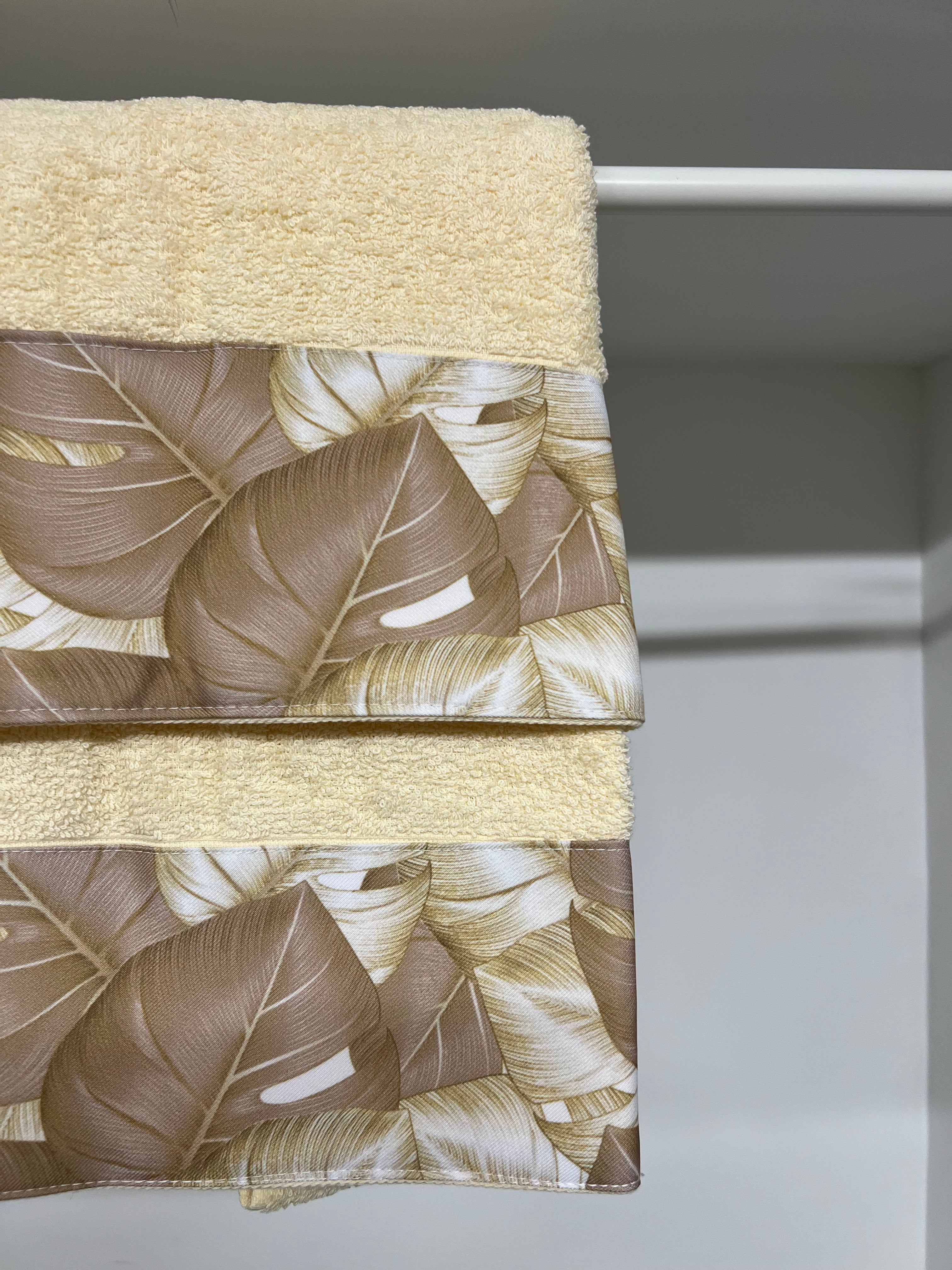 Asciugamano Bagno 1+1 con Balza in Stampa Digitale Tropical Tortora-Oro